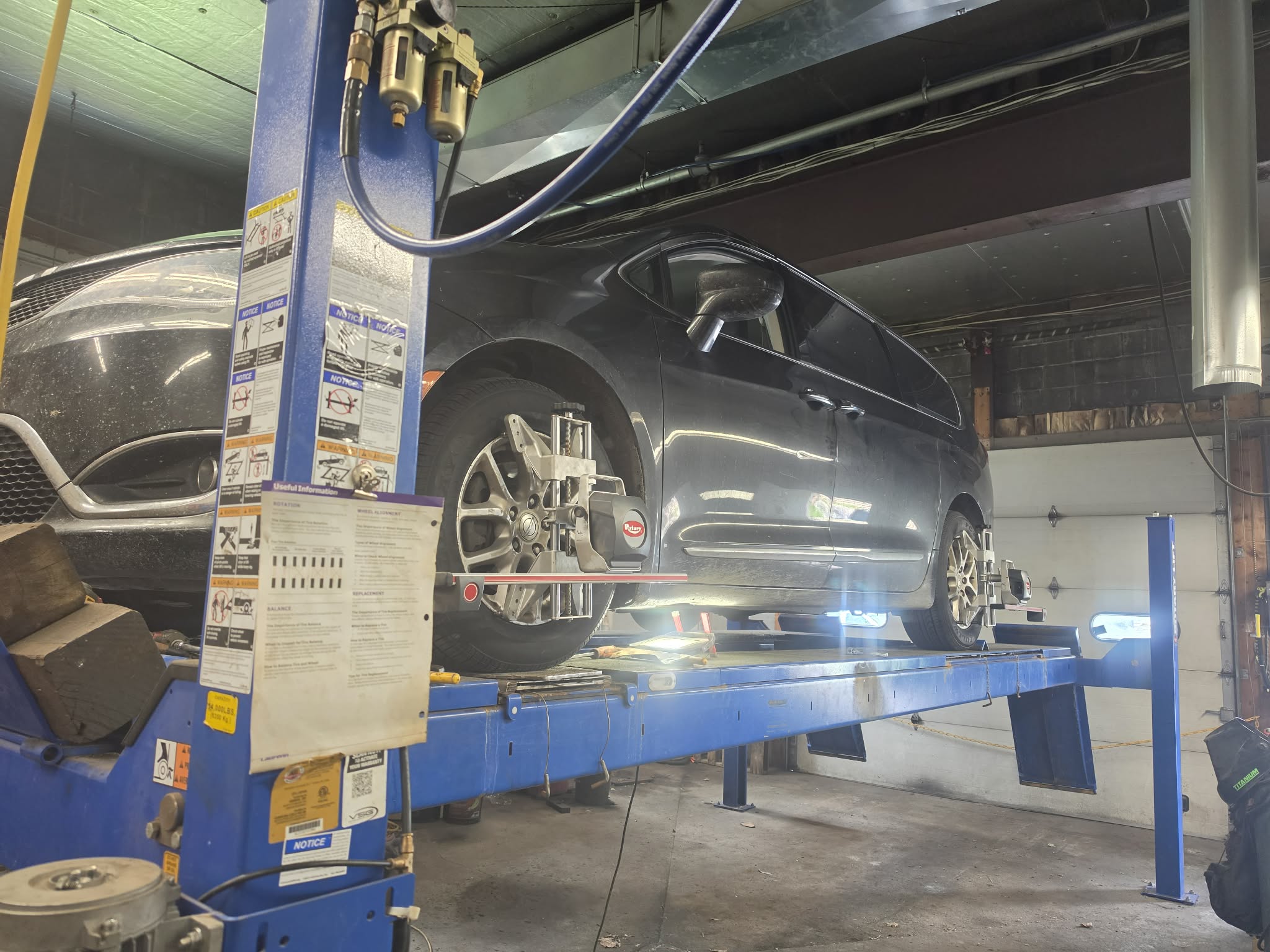 Vehicle positioned on the S&D wheel alignment rack